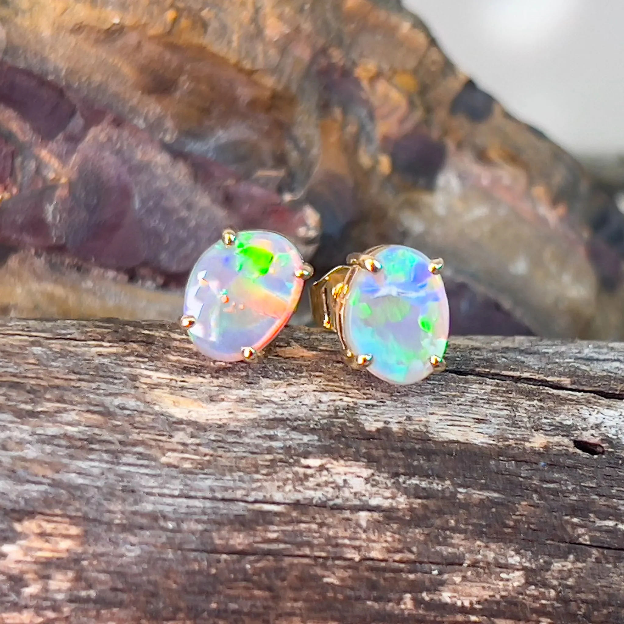 14kt Yellow Gold pair of Black Opals 1.38ct claw set