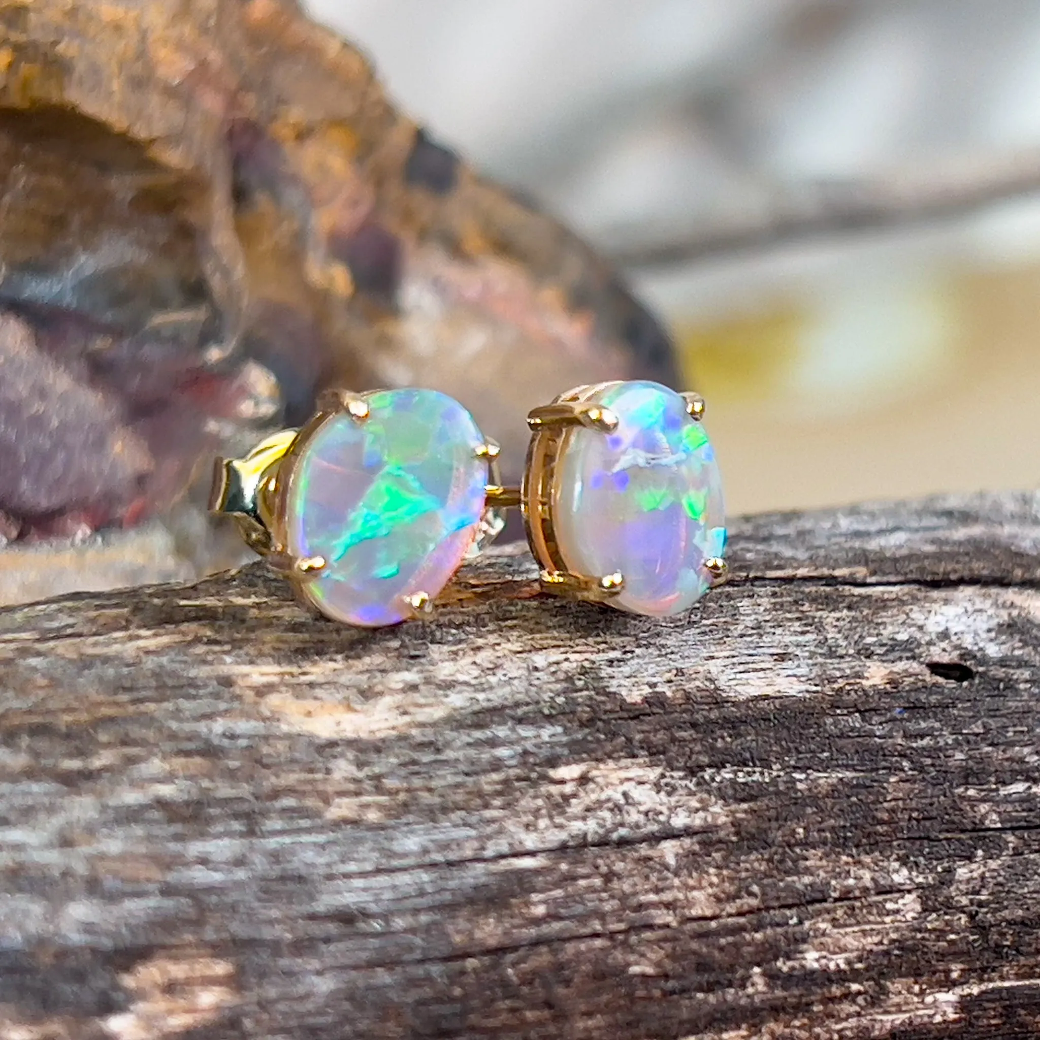 14kt Yellow Gold pair of Black Opals 1.38ct claw set