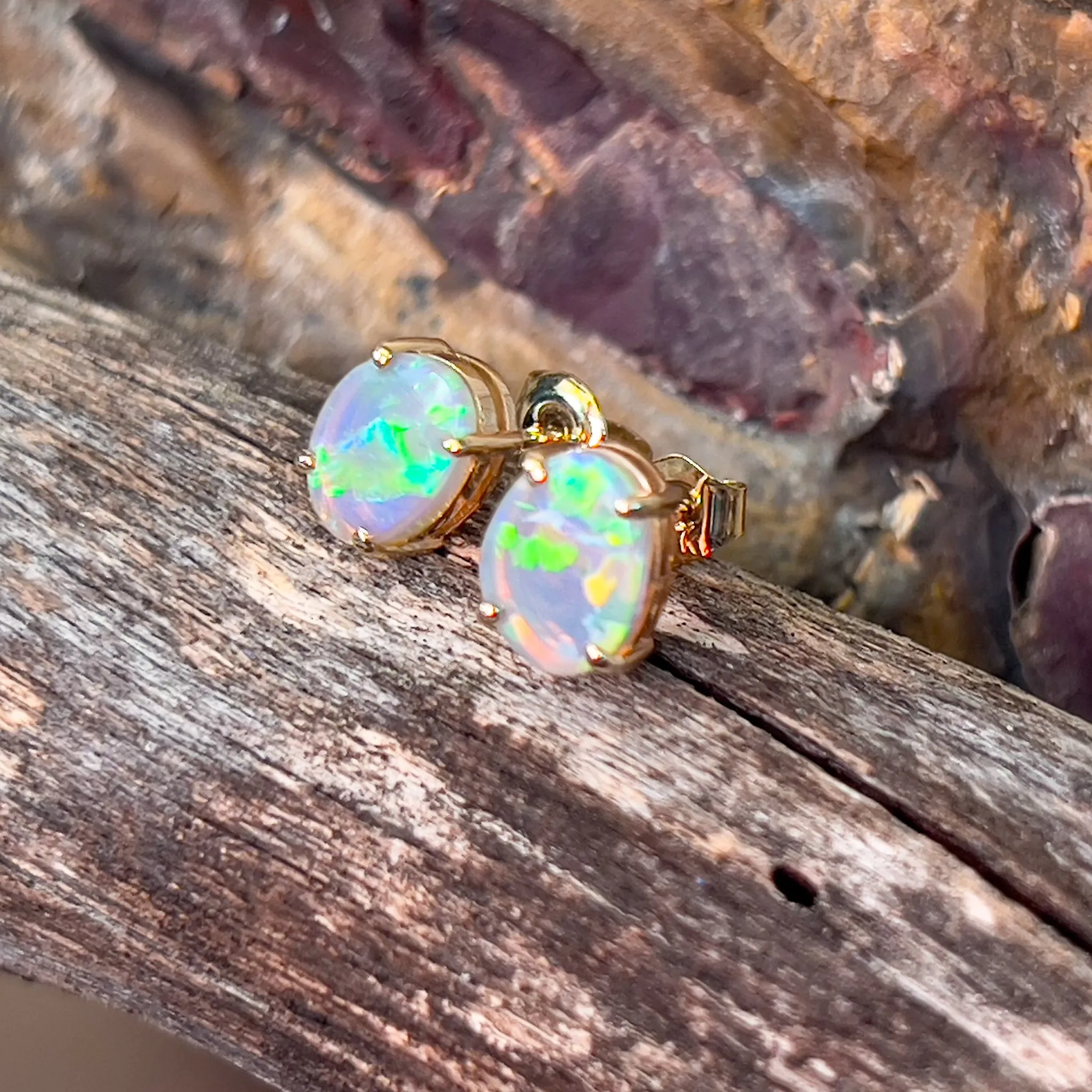 14kt Yellow Gold pair of Black Opals 1.38ct claw set