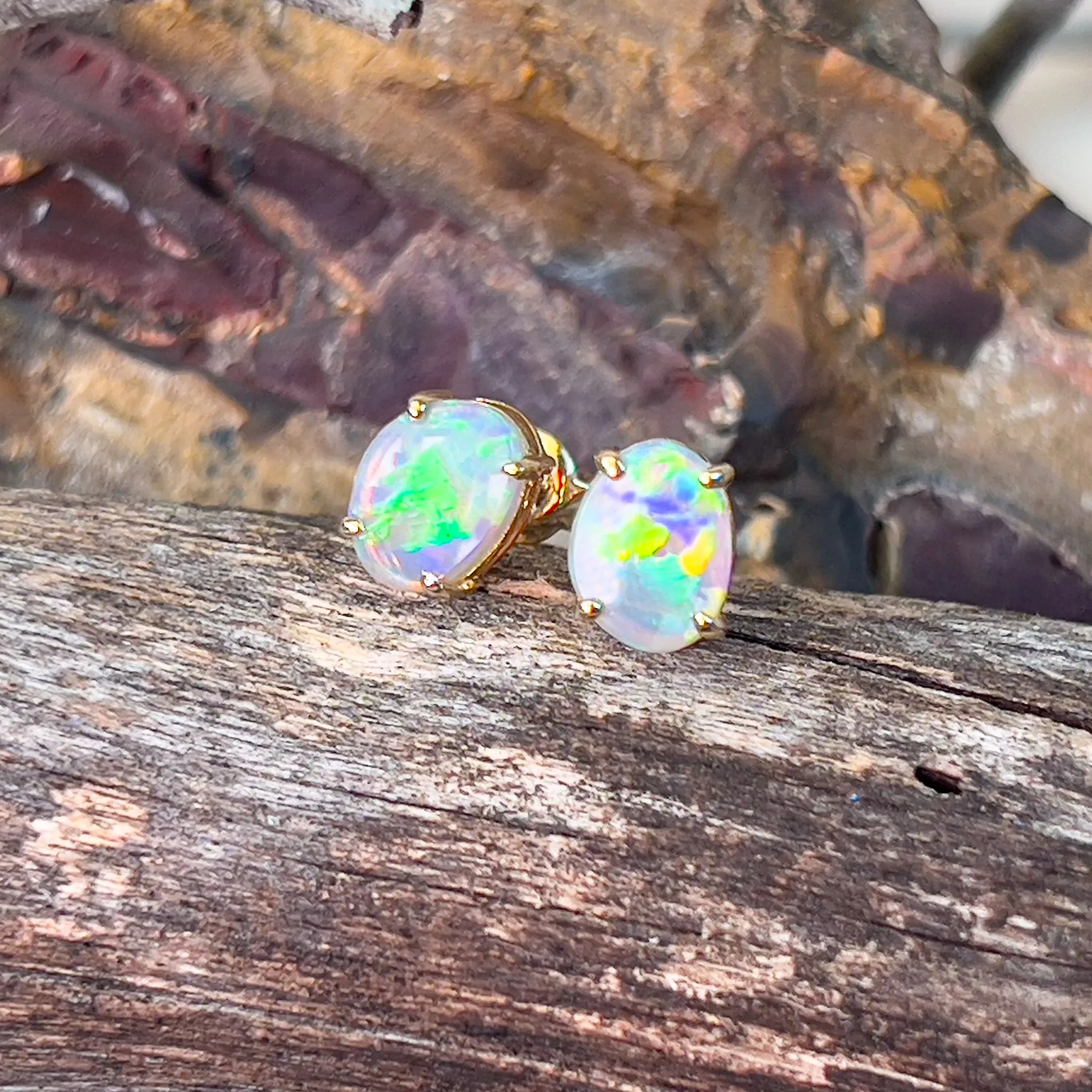 14kt Yellow Gold pair of Black Opals 1.38ct claw set