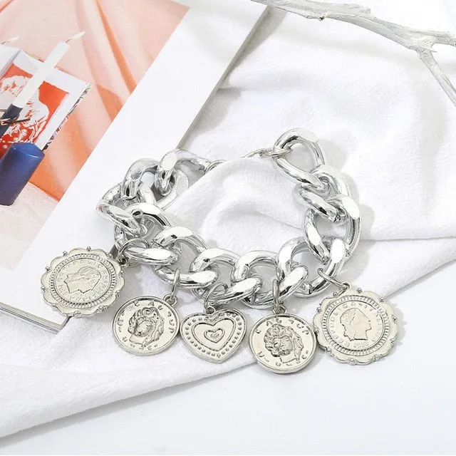 Big chunky gold charm bracelet