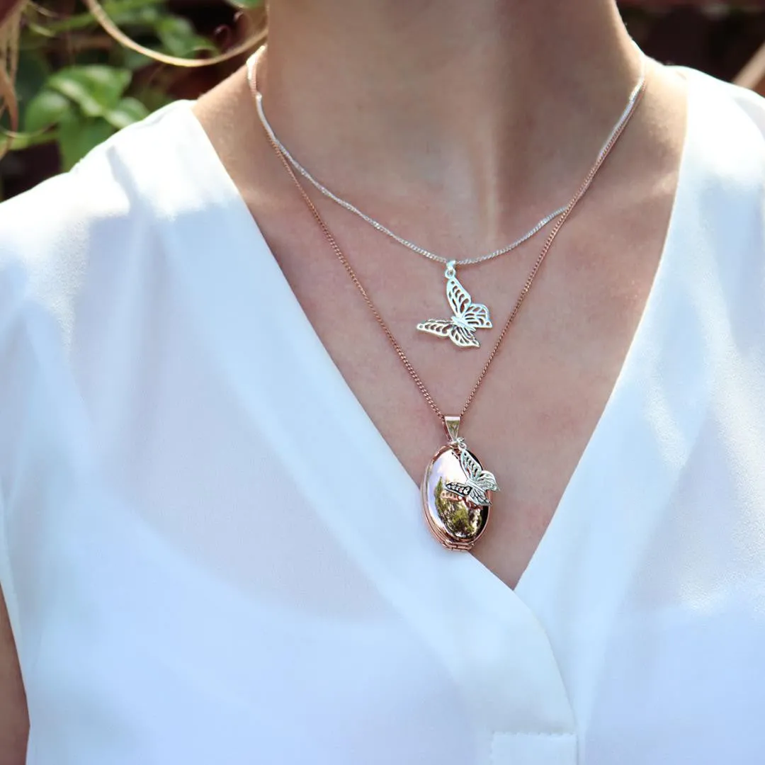 Four Photo Oval Butterfly Locket | Silver