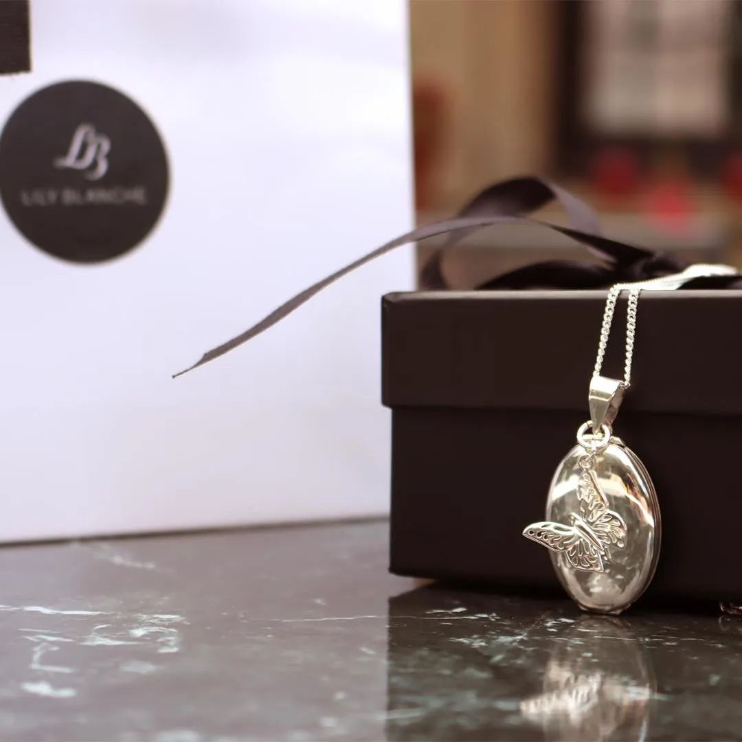 Four Photo Oval Butterfly Locket | Silver