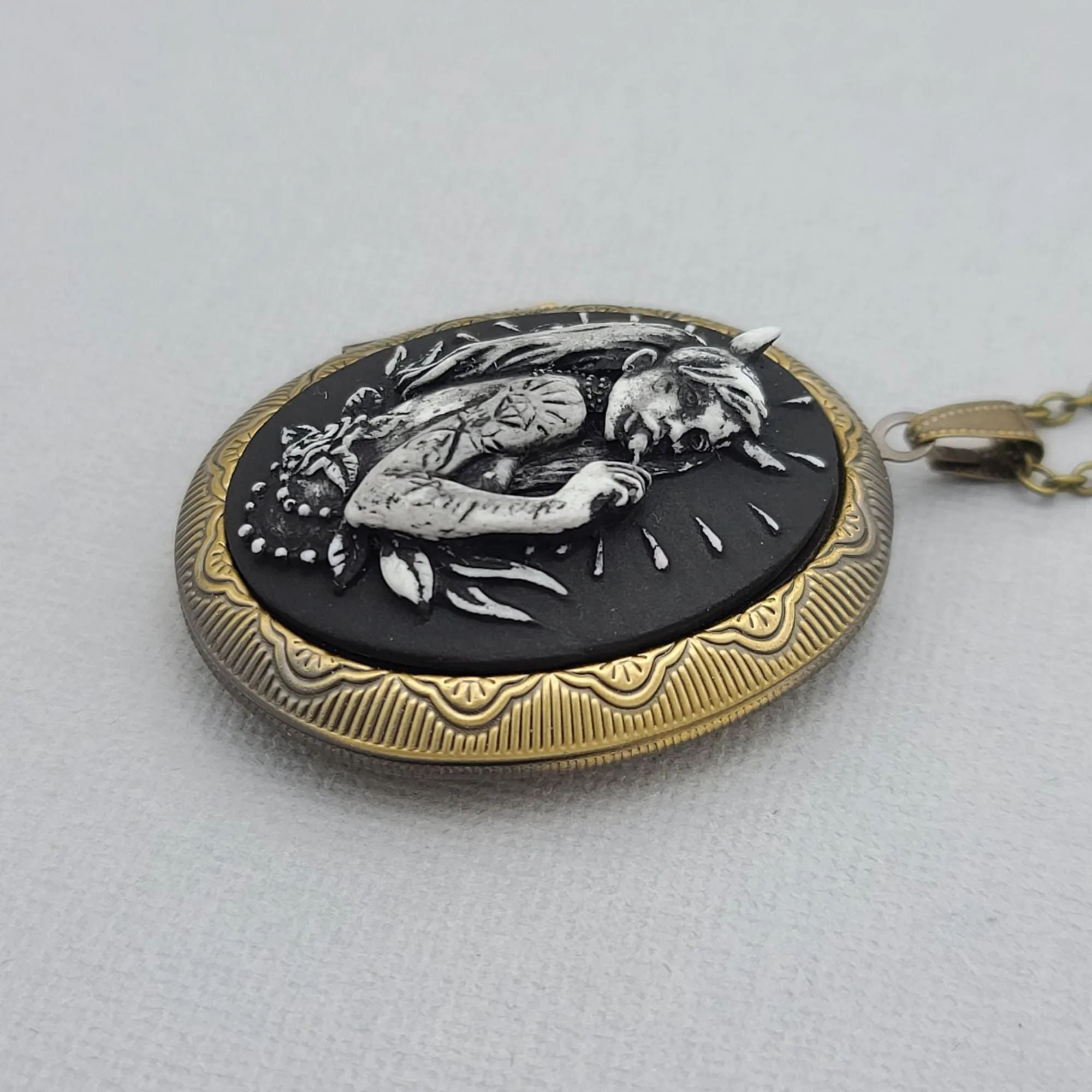 Ox Brass Oval Locket Devil Girl Cameo Photo Locket.