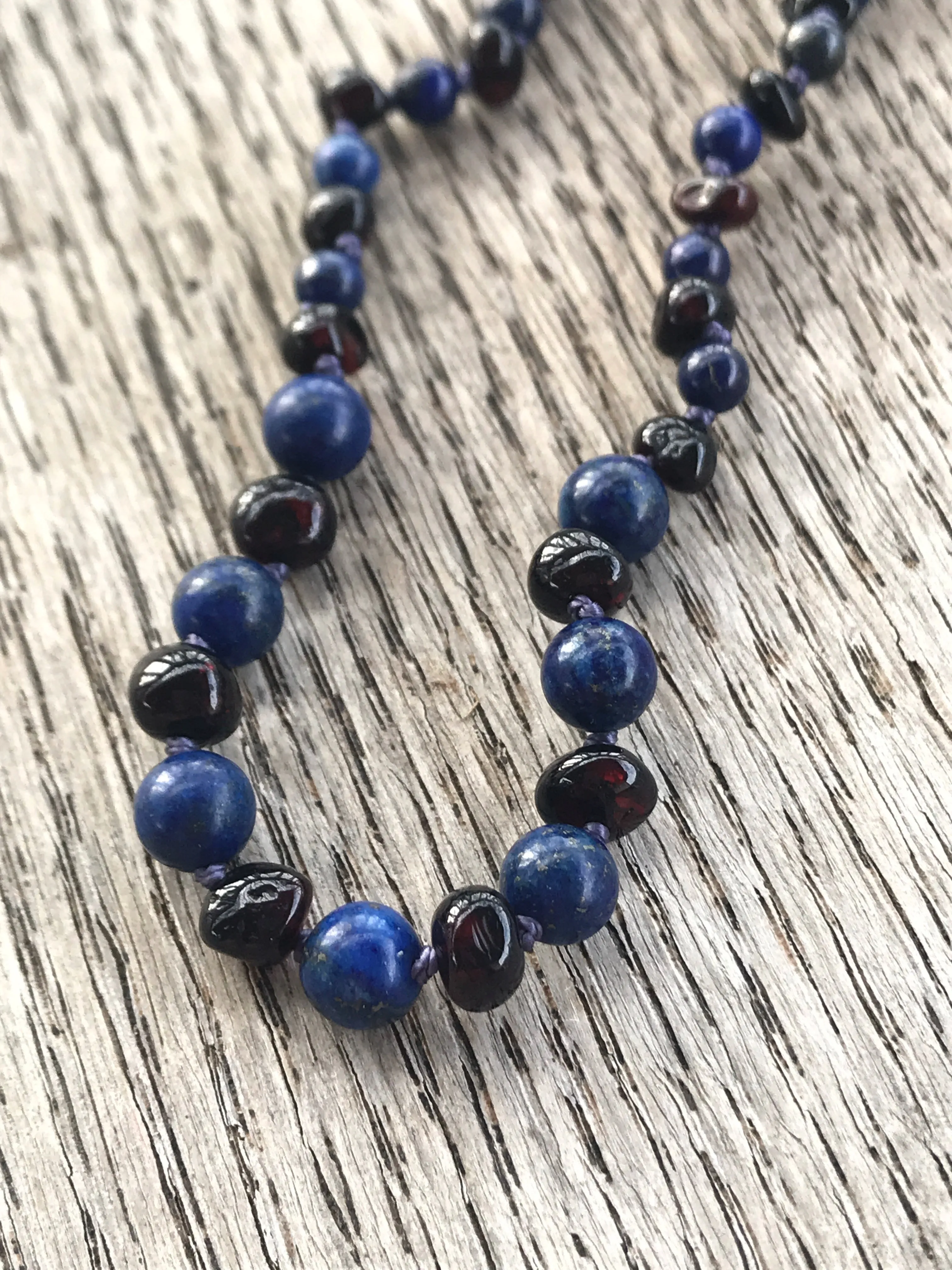 Polished Baltic amber and gemstone teething necklace
