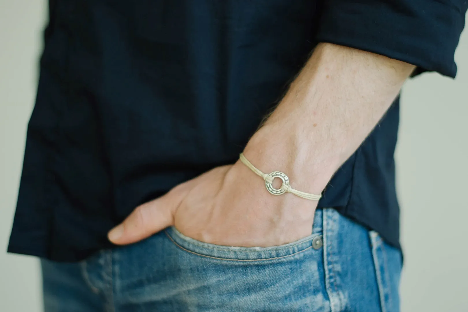 Silver karma circle charm bracelet for men, Adjustable beige cord, yoga jewelry