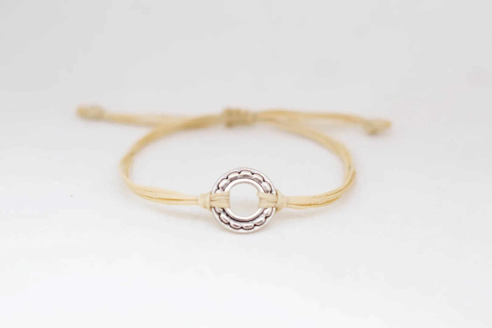 Silver karma circle charm bracelet for men, Adjustable beige cord, yoga jewelry
