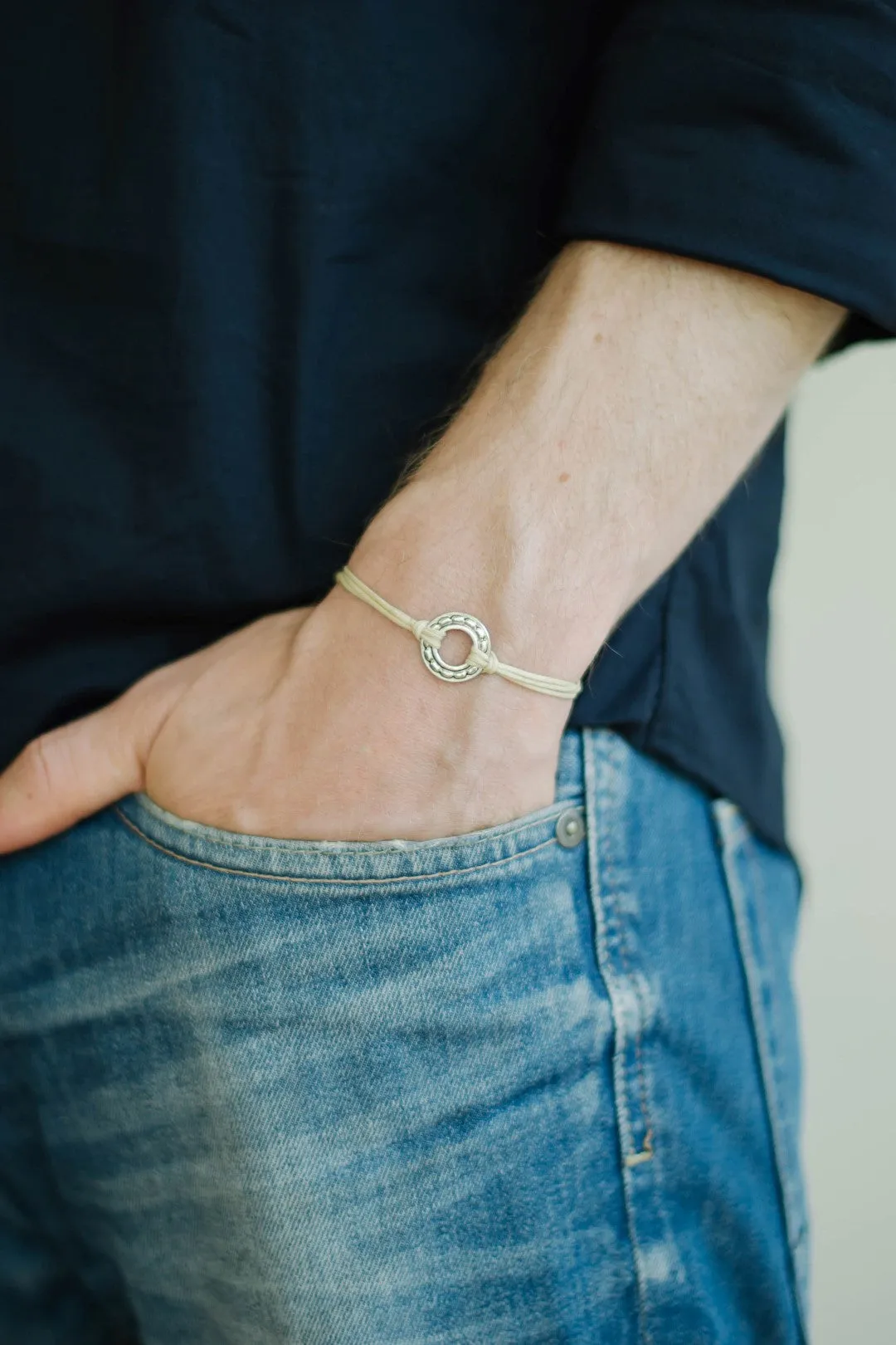 Silver karma circle charm bracelet for men, Adjustable beige cord, yoga jewelry