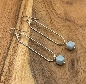 Sterling silver hammer textured oval hoops with blue opal