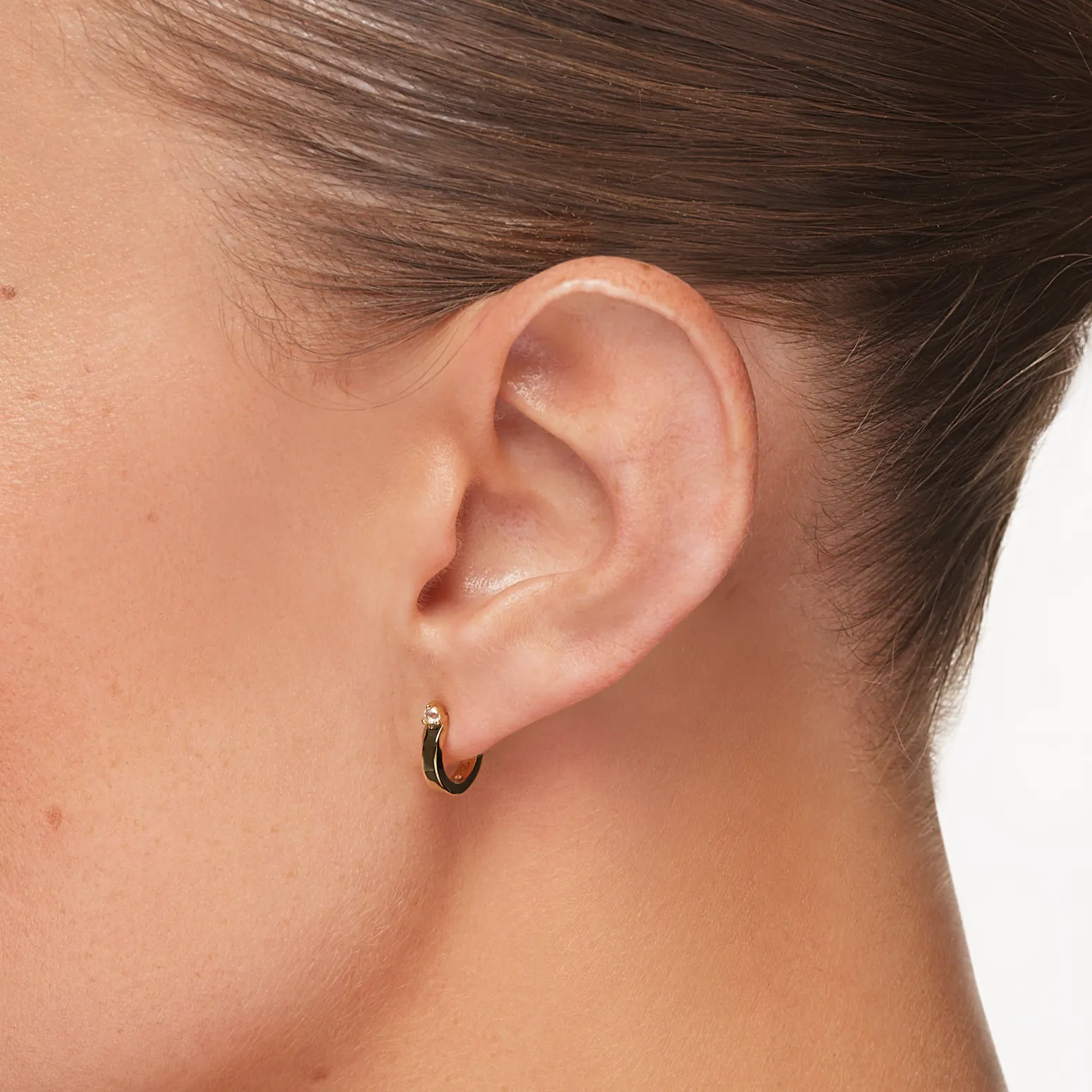 White Topaz Stud Huggies in Gold